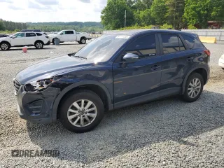 2016 Mazda CX-5 Sport z VIN JM3KE4BY8G0837052, wystawiony jako Copart lot #54700235 z przebiegiem 124 172 mil mil oraz Szkoda całkowita • Salvage title. Historia ofert i sprzedaży dostępna na DreamBid. Obrazek 1.