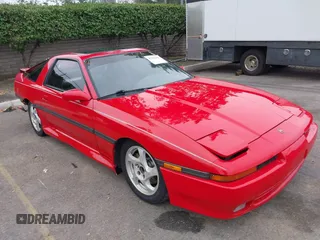 1990 Toyota Supra z VIN JT2MA71M3L0141506, wystawiony jako IAAI lot #42342303 z przebiegiem 133 391 mil mil oraz . Historia ofert i sprzedaży dostępna na DreamBid. Obrazek 1.