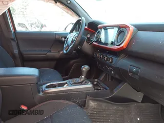2016 Toyota Tacoma SR with VIN 3TMCZ5AN5GM031794, listed as a IAAI auction lot 41880146 with 87,287 mi miles and . Bid and sale history available at DreamBid. Image 5.
