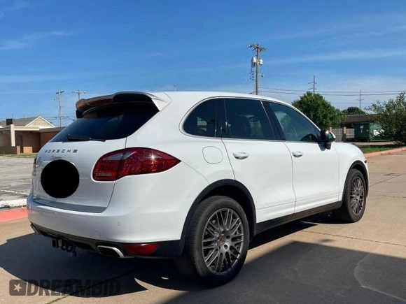 2014 Porsche Cayenne with VIN WP1AA2A2XELA09323, listed as a Copart auction lot 61265345 with 204,292 mi miles and Clean title. Bid and sale history available at DreamBid. Image 4.