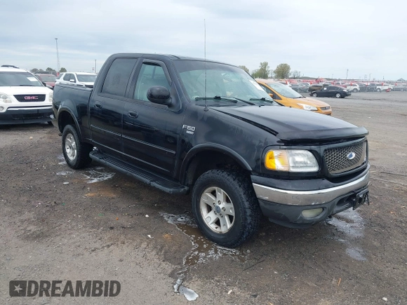 2002 Ford F-150 XLT with VIN 1FTRW08L32KD90202, listed as a IAAI auction lot 41850546 with 256,807 mi miles. Bid and sale history available at carsss.com. Image 1.