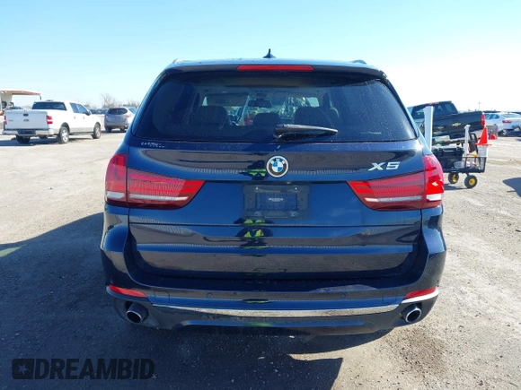 2016 BMW X5 sDrive35i with VIN 5UXKR2C55G0R71330, listed as a IAAI auction lot 41661140 with 128,457 mi miles. Bid and sale history available at carsss.com. Image 16.