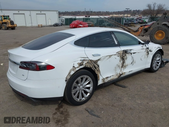 2016 Tesla Model S 70 kWh Battery with VIN 5YJSA1E15GF135841, listed as a IAAI auction lot 41846535 with 87,312 mi miles. Bid and sale history available at carsss.com. Image 4.