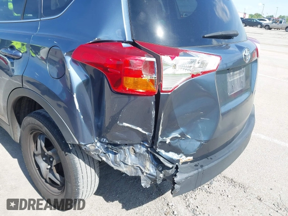 2014 Toyota RAV4 LE with VIN 2T3ZFREV1EW093290, listed as a IAAI auction lot 42343278 with 318,635 mi miles and . Bid and sale history available at DreamBid. Image 6.
