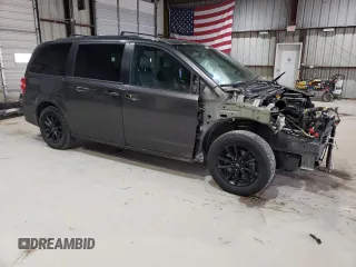 2019 Dodge Grand Caravan GT with VIN 2C4RDGEG9KR694822, listed as a Copart auction lot 50959695 with 121,697 mi miles and Salvage Title. Bid and sale history available at DreamBid. Image 4.