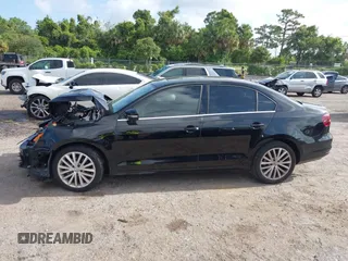 2016 Volkswagen Jetta SEL z VIN 3VWL07AJ2GM259395, wystawiony jako IAAI lot #42448235 z przebiegiem 101 032 mil mil oraz . Historia ofert i sprzedaży dostępna na DreamBid. Obrazek 14.