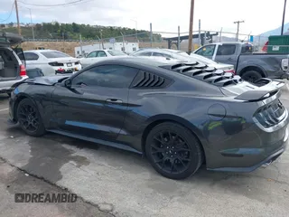 2018 Ford Mustang EcoBoost z VIN 1FA6P8THXJ5154523, wystawiony jako IAAI lot #41523923 z przebiegiem 94 330 mil mil oraz . Historia ofert i sprzedaży dostępna na DreamBid. Obrazek 14.
