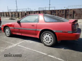 1989 Toyota Supra z VIN JT2MA70J3K0114537, wystawiony jako Copart lot #72587854 z przebiegiem 189 813 mil mil oraz Czysty tytuł • Clean title. Historia ofert i sprzedaży dostępna na DreamBid. Obrazek 2.