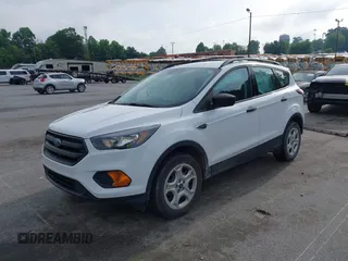 2018 Ford Escape S with VIN 1FMCU0F75JUC89890, listed as a IAAI auction lot 42475253 with 104,500 mi miles and . Bid and sale history available at DreamBid. Image 2.