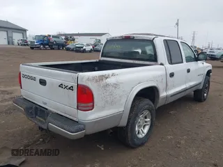 2002 Dodge Dakota SLT z VIN 1B7HG48N72S577296, wystawiony jako IAAI lot #41848637 z przebiegiem 133 777 mil mil oraz . Historia ofert i sprzedaży dostępna na DreamBid. Obrazek 12.