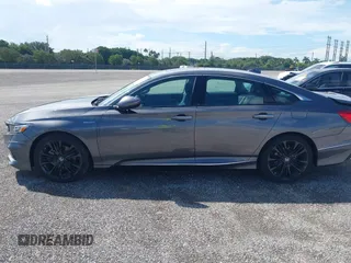 2022 Honda Accord Touring with VIN 1HGCV3F91NA031010, listed as a IAAI auction lot 40302407 with 18,820 mi miles and . Bid and sale history available at DreamBid. Image 14.