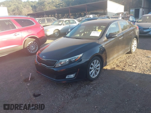 2015 Kia Optima LX z VIN KNAGM4A71F5629636, wystawiony jako IAAI lot #41677983 z przebiegiem 150 600 mil mil oraz . Historia ofert i sprzedaży dostępna na DreamBid. Obrazek 2.