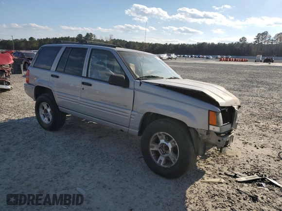 1998 Jeep Grand Cherokee with VIN 1J4GX48Y7WC216585, listed as a Copart auction lot 83532184 with 144,739 mi miles and Salvage title. Bid and sale history available at DreamBid. Image 4.
