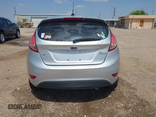 2014 Ford Fiesta SE with VIN 3FADP4EJ4EM151911, listed as a IAAI auction lot 42096321 with 129,938 mi miles and . Bid and sale history available at DreamBid. Image 17.
