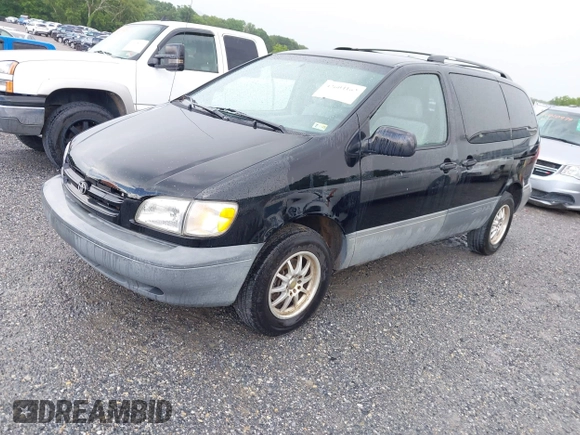 1998 Toyota Sienna LE with VIN 4T3ZF13C6WU016001, listed as a IAAI auction lot 42604162 with 214,491 mi miles and . Bid and sale history available at DreamBid. Image 2.