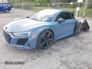 2021 Audi R8 z VIN WUAKBAFX5M7900468, wystawiony jako IAAI lot #41214857 z przebiegiem Nie podano mil oraz . Historia ofert i sprzedaży dostępna na DreamBid. Obrazek 2.