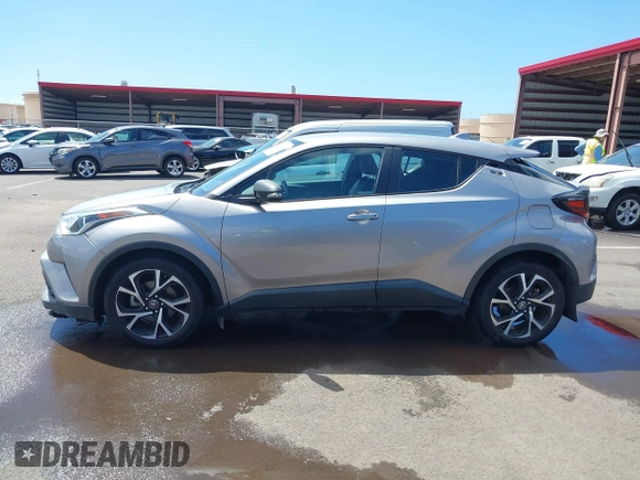 2018 Toyota C-HR XLE z VIN NMTKHMBX5JR009504, wystawiony jako IAAI lot #41776136 z przebiegiem 63 795 mil mil oraz . Historia ofert i sprzedaży dostępna na DreamBid. Obrazek 14.