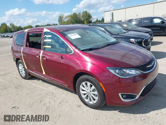 2018 Chrysler Pacifica Touring L with VIN 2C4RC1BG0JR279665, listed as a IAAI auction lot 40336389 with 80,835 mi miles and . Bid and sale history available at DreamBid. Image 1.