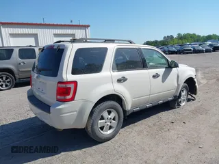 2012 Ford Escape XLT with VIN 1FMCU0D71CKC60534, listed as a IAAI auction lot 39305965 with 120,198 mi miles and . Bid and sale history available at DreamBid. Image 4.