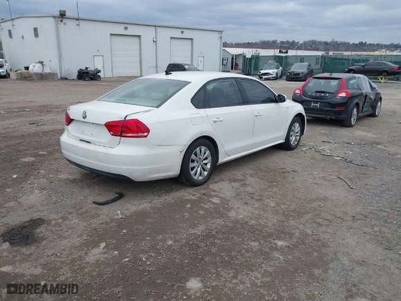 2014 Volkswagen Passat Wolfsburg Ed with VIN 1VWAT7A38EC087906, listed as a IAAI auction lot 41623631 with 124,079 mi miles. Bid and sale history available at carsss.com. Image 4.