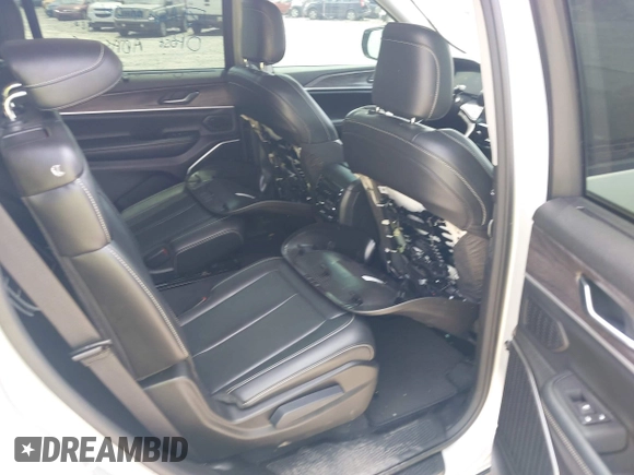2022 Jeep Grand Cherokee Limited with VIN 1C4RJJBG6N8574549, listed as a IAAI auction lot 42299157 with 69,396 mi miles and . Bid and sale history available at DreamBid. Image 8.