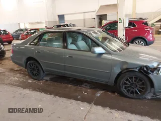 2000 Toyota Avalon XL with VIN 4T1BF28B9YU111753, listed as a IAAI auction lot 41243138 with 113,324 mi miles and . Bid and sale history available at DreamBid. Image 12.
