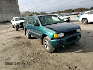1998 Isuzu Rodeo S z VIN 4S2CK58W0W4339022, wystawiony jako Copart lot #78746864 z przebiegiem 136 138 mil mil oraz Szkoda całkowita • Salvage title. Historia ofert i sprzedaży dostępna na DreamBid. Obrazek 12.