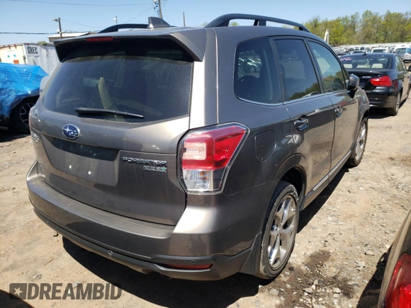 2017 Subaru Forester Touring with VIN JF2SJAWC7HH560321, listed as a Copart auction lot 44384492 with 69,280 mi miles and . Bid and sale history available at DreamBid. Image 4.