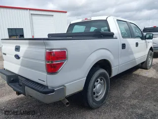 2013 Ford F-150 XL with VIN 1FTEW1CM9DFC58691, listed as a IAAI auction lot 41413917 with 134,597 mi miles. Bid and sale history available at carsss.com. Image 4.