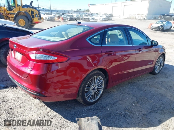 2014 Ford Fusion SE Hybrid with VIN 3FA6P0LU3ER251743, listed as a IAAI auction lot 41625631 with 136,355 mi miles. Bid and sale history available at carsss.com. Image 4.