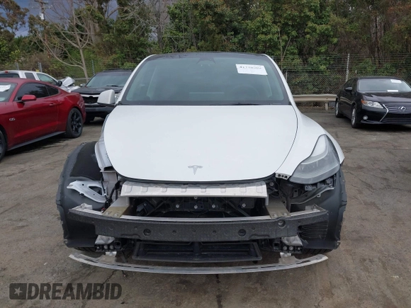 2023 Tesla Model Y Long Range z VIN 7SAYGDEE4PF621640, wystawiony jako IAAI lot #41796502 z przebiegiem 68 484 mil mil oraz . Historia ofert i sprzedaży dostępna na DreamBid. Obrazek 13.