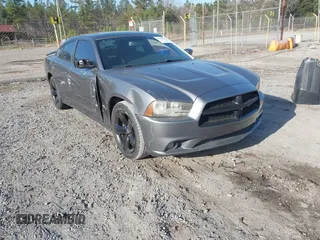 2012 Dodge Charger SXT with VIN 2C3CDXHG9CH164380, listed as a IAAI auction lot 41624654 with 158,694 mi miles. Bid and sale history available at carsss.com. Image 1.
