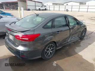 2016 Ford Focus SE z VIN 1FADP3F28GL360512, wystawiony jako IAAI lot #42427723 z przebiegiem 217 172 mil mil oraz . Historia ofert i sprzedaży dostępna na DreamBid. Obrazek 4.