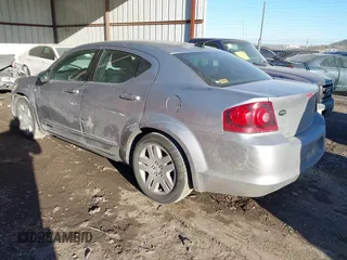 2013 Dodge Avenger SE with VIN 1C3CDZAB4DN590562, listed as a IAAI auction lot 41689241 with 258,167 mi miles and . Bid and sale history available at carsss.com. Image 3.