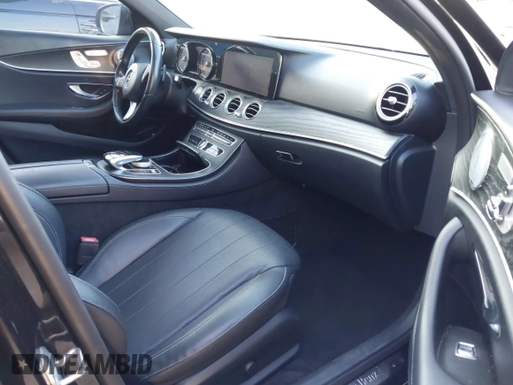 2018 Mercedes-Benz E-Class E 300 with VIN WDDZF4JB7JA468452, listed as a IAAI auction lot 41441293 with 87,552 mi miles. Bid and sale history available at carsss.com. Image 5.