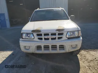 2001 Isuzu Rodeo S with VIN 4S2CK58W514310849, listed as a Copart auction lot 89221945 with 138,720 mi miles and Salvage title. Bid and sale history available at DreamBid. Image 5.