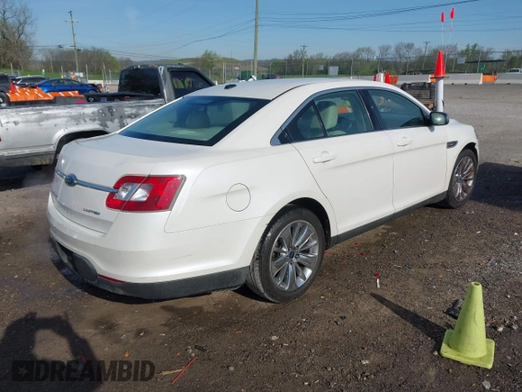 2010 Ford Taurus Limited with VIN 1FAHP2FWXAG112342, listed as a IAAI auction lot 42005142 with 148,947 mi miles. Bid and sale history available at carsss.com. Image 4.