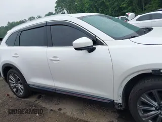 2021 Mazda CX-9 Signature with VIN JM3TCBEY4M0517118, listed as a IAAI auction lot 42400675 with 56,260 mi miles and . Bid and sale history available at DreamBid. Image 14.