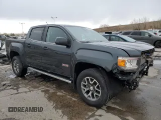 2018 GMC Canyon z VIN 1GTP6CE1XJ1173875, wystawiony jako Copart lot #47258005 z przebiegiem 104 076 mil mil oraz Szkoda całkowita • Salvage title. Historia ofert i sprzedaży dostępna na DreamBid. Obrazek 4.