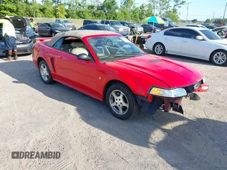 2002 Ford Mustang Deluxe z VIN 1FAFP44442F179840, wystawiony jako IAAI lot #42603841 z przebiegiem 132 149 mil mil oraz . Historia ofert i sprzedaży dostępna na DreamBid. Obrazek 1.