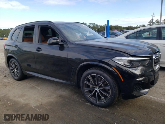 2022 BMW X5 xDrive40i with VIN 5UXCR6C05N9M87988, listed as a Copart auction lot 70896652 with 571 mi miles. Bid and sale history available at carsss.com. Image 4.