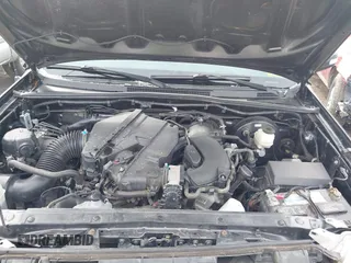 2014 Toyota Tacoma with VIN 3TMLU4EN1EM148353, listed as a IAAI auction lot 41602756 with 89,563 mi miles. Bid and sale history available at carsss.com. Image 10.