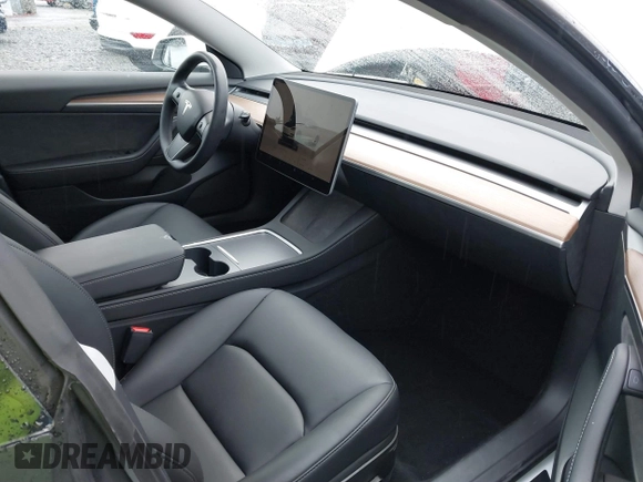2023 Tesla Model 3 Performance z VIN 5YJ3E1EC9PF545648, wystawiony jako IAAI lot #41573583 z przebiegiem 15 207 mil mil oraz . Historia ofert i sprzedaży dostępna na DreamBid. Obrazek 5.
