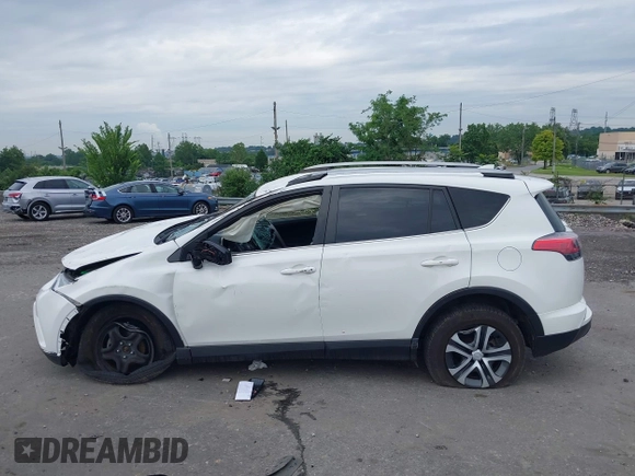 2018 Toyota RAV4 LE with VIN JTMBFREV6JJ210226, listed as a IAAI auction lot 42700312 with Not provided miles and . Bid and sale history available at DreamBid. Image 15.