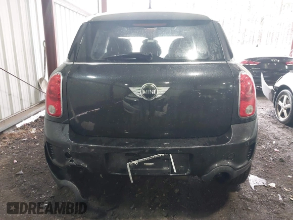2014 MINI Countryman S with VIN WMWZC5C53EWP40677, listed as a IAAI auction lot 41473281 with 108,616 mi miles and . Bid and sale history available at DreamBid. Image 16.