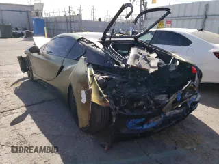 2016 BMW i8 z VIN WBY2Z2C51GV674865, wystawiony jako Copart lot #40417413 z przebiegiem 59 325 mil mil oraz . Historia ofert i sprzedaży dostępna na DreamBid. Obrazek 2.
