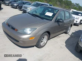 2004 Ford Focus SE with VIN 1FAFP34364W187989, listed as a IAAI auction lot 41838413 with 111,406 mi miles and . Bid and sale history available at DreamBid. Image 2.