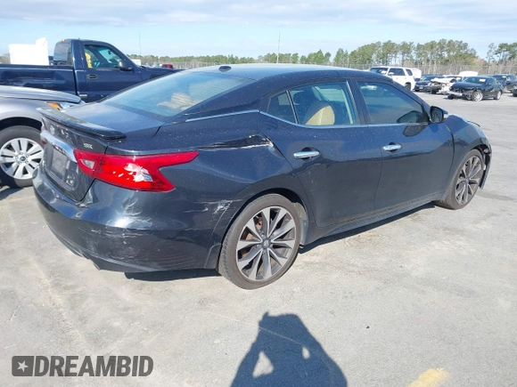 2016 Nissan Maxima S with VIN 1N4AA6AP5GC902108, listed as a IAAI auction lot 41800062 with 161,492 mi miles and . Bid and sale history available at DreamBid. Image 4.