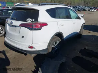 2016 Toyota RAV4 LE with VIN 2T3BFREV5GW411917, listed as a IAAI auction lot 41877542 with 52,512 mi miles. Bid and sale history available at carsss.com. Image 4.