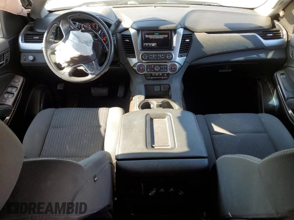 2020 Chevrolet Tahoe LS with VIN 1GNSCAKC4LR194911, listed as a Copart auction lot 83041644 with 118,716 mi miles and Salvage title. Bid and sale history available at DreamBid. Image 8.
